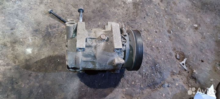 Компрессор кондициоцера Рено Логан 1