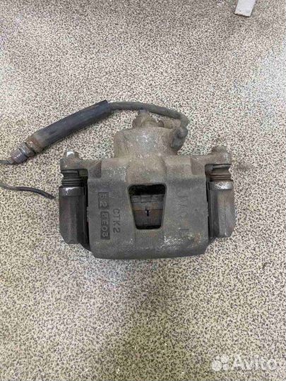 Суппорт тормозной передний левый Peugeot 307