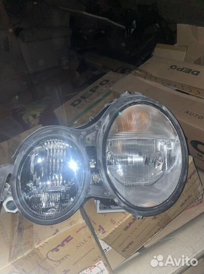 Фара передняя левая Mercedes Benz W210