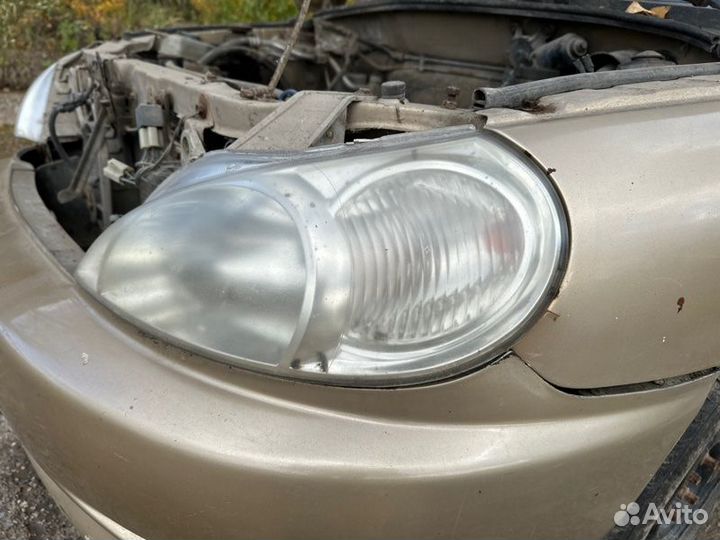 Фара левая Kia Rio седан 1.5 A5D 2001