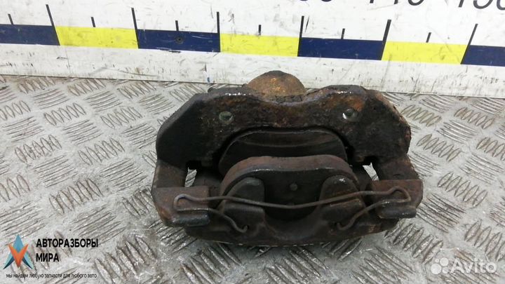 Суппорт передний левый Mazda 3 BK рест. 2007