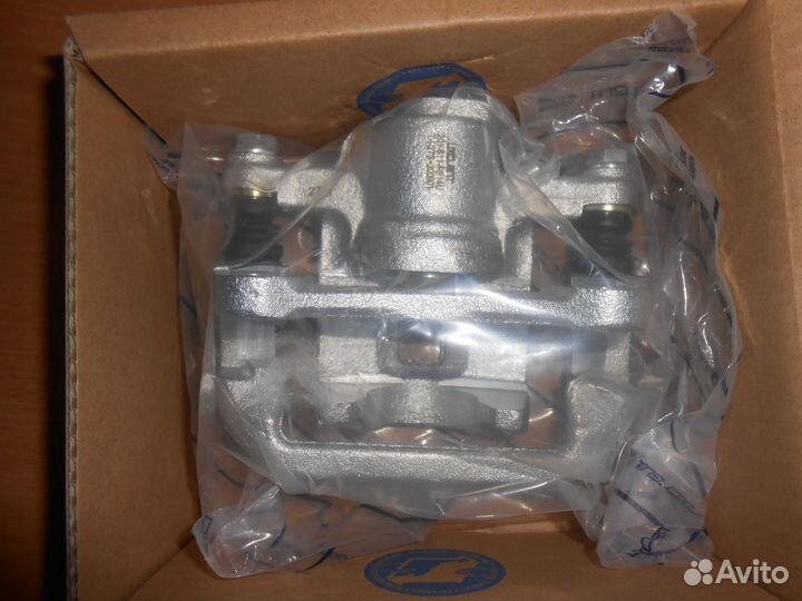 Суппорт тормозной задний правый Шевроле Лачетти