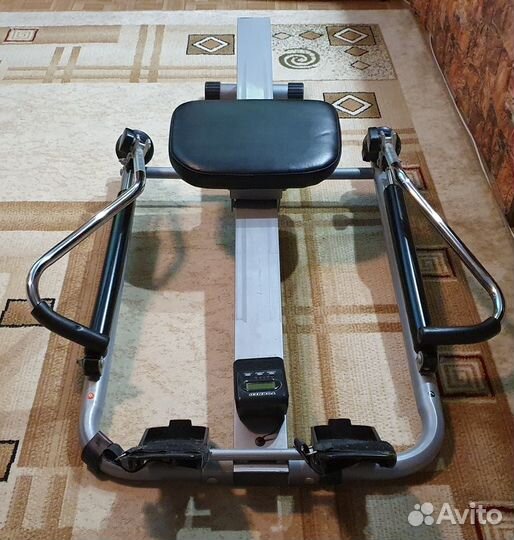 Гребной тренажер