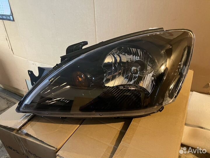 Фара черная MMC Lancer 9