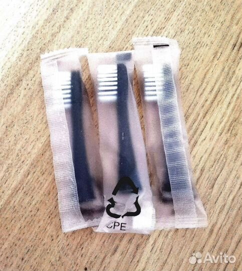 Электрическая зубная щетка