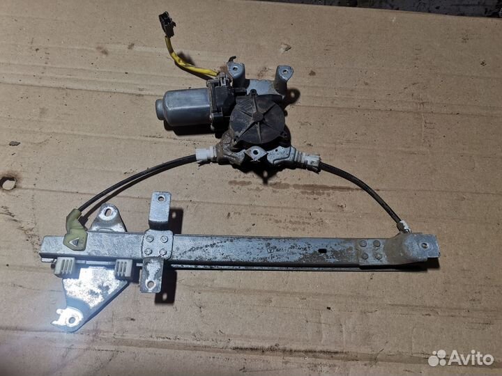 Стеклоподъемник задний левый Nissan Almera Tino