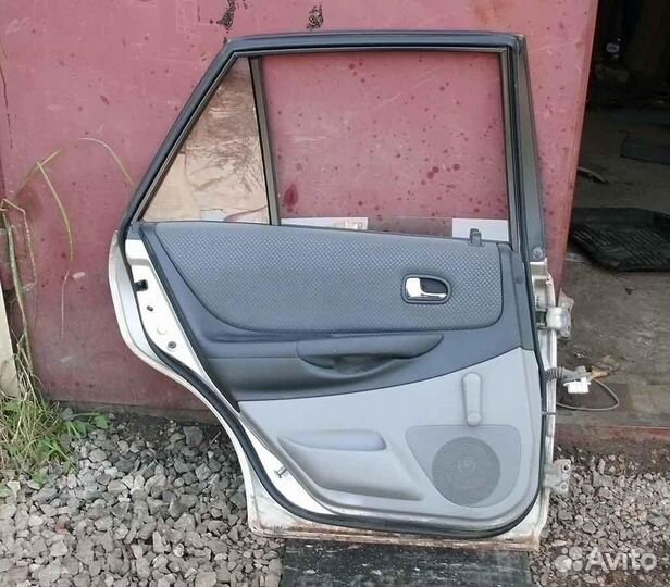 Дверь задняя левая Mazda 323F Хэтчбек