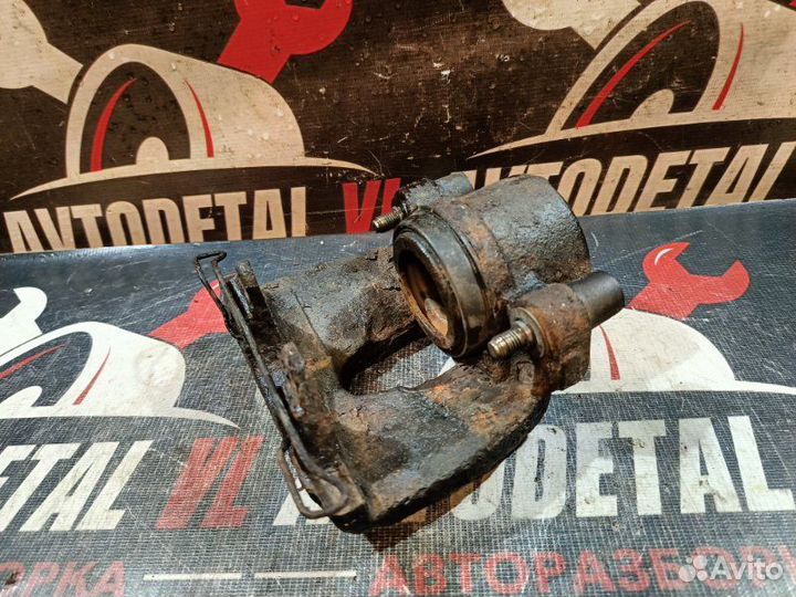 Суппорт тормозной передний левый Ford Focus 2