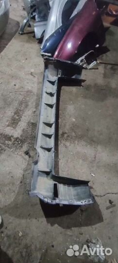 Бампер задний Nissan Elgrand E50