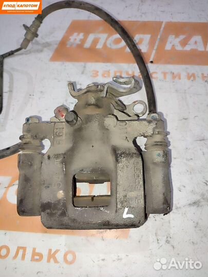 Суппорт тормозной задний левый Mitsubishi 4605B649