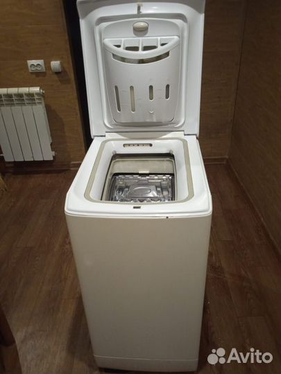 Стиральная машина с вертикальной загрузкой