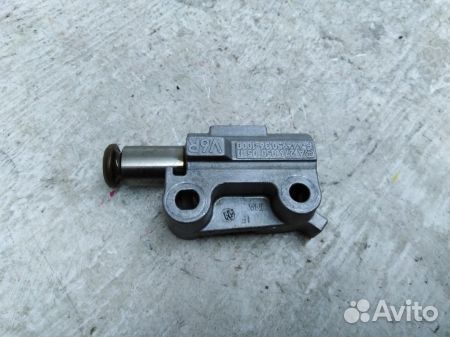 Натяжитель цепи грм