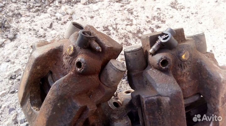 Суппорт тормозной передний - задний BMW E34