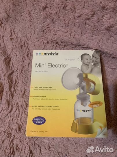 Молокоотсос medela электрический