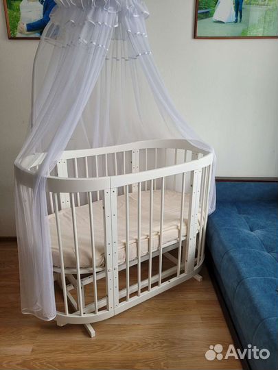 Детская кроватка трансформер с маятником овальная