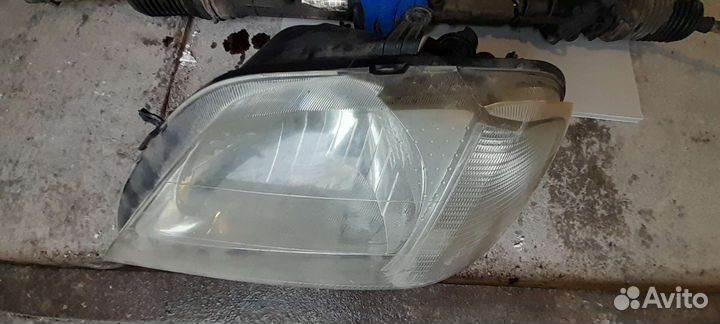 Фара левая для рено-логан