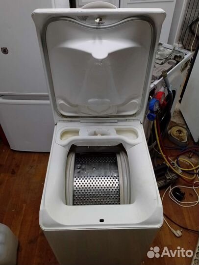 Стиральная машина с вертикальной загрузкой