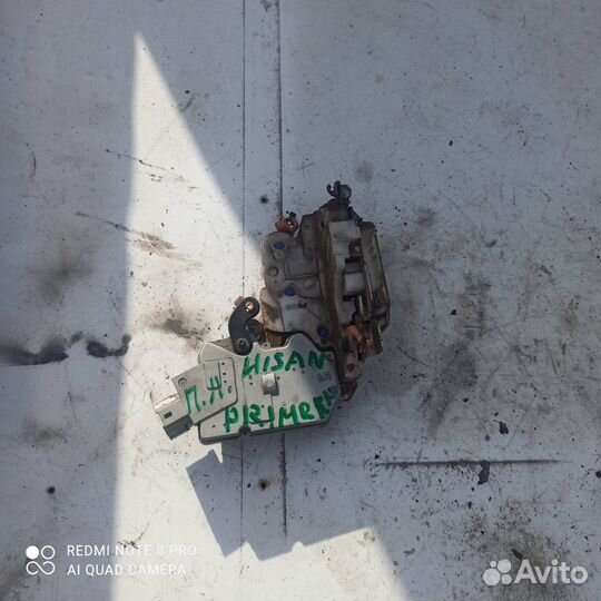 Замок передний левый Nissan Primera P11