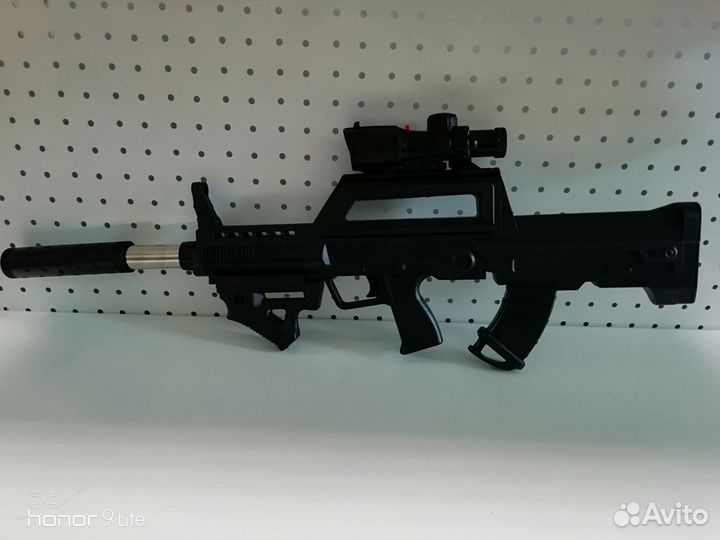 Игрушечный пластиковый автомат на пульках