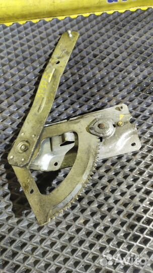 Стеклоподъемник электр. задний левый Ford Escort