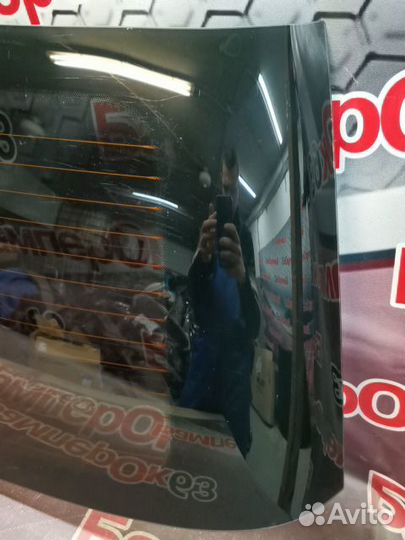 Стекло заднее Opel Astra Н
