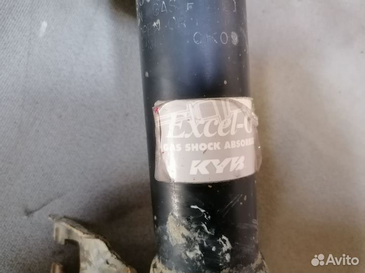 Амортизатор передний левый Nissan Almera Class