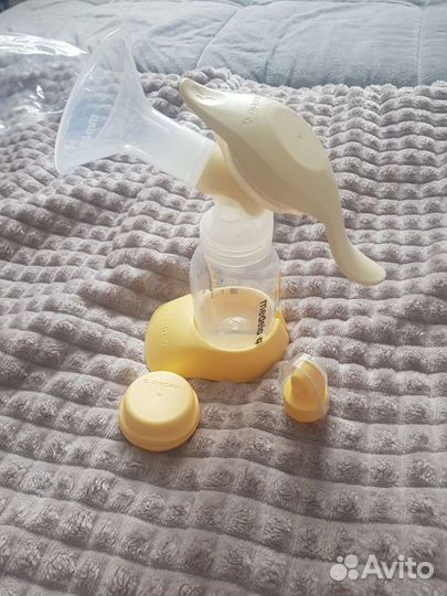 Молокоотсос medela ручной