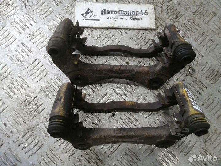 Скоба тормозного суппорта Mitsubishi Lancer X