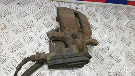 Суппорт тормозной задний левый audi A4 B8 (7NI08LS