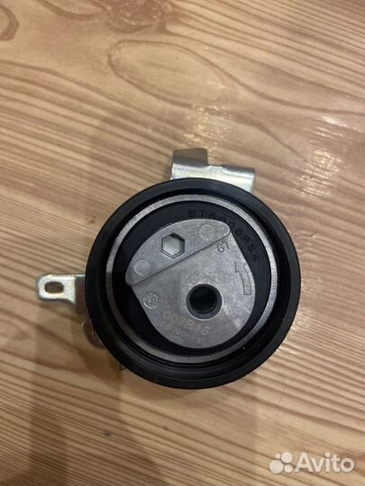 Новый ролик натяжителя грм