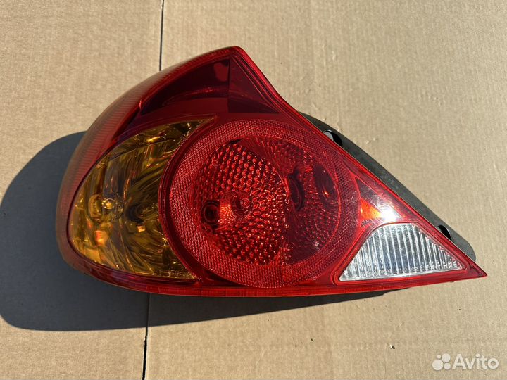 Фонарь задний левый Kia Spectra