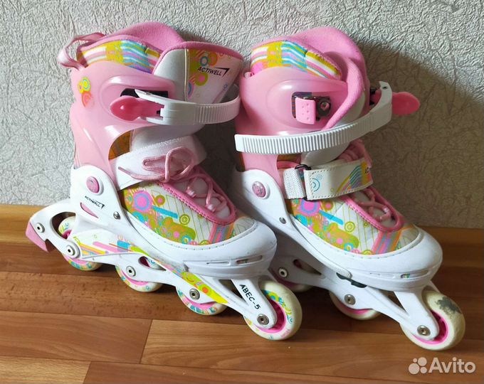 Роликовые коньки