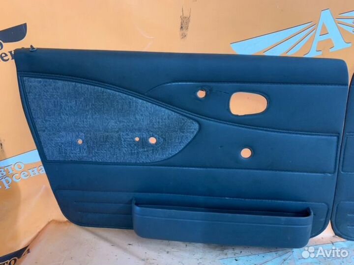 Обшивка боковой двери передняя Daewoo Nexia седан