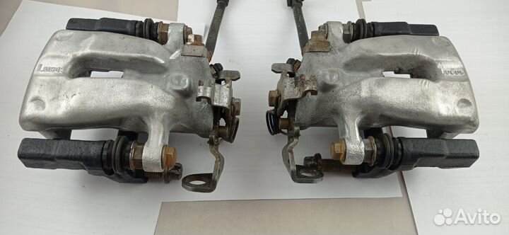 Суппорт тормозной задний Opel Astra G 1999