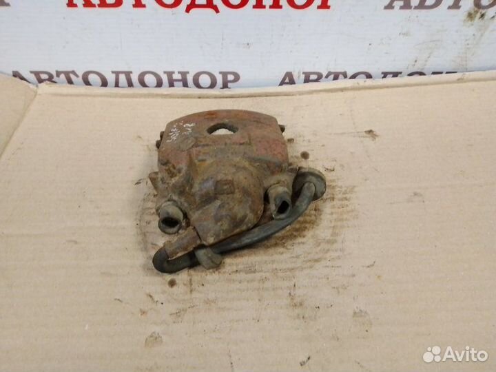 Суппорт тормозной передний левый Volkswagen Golf 2