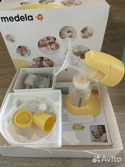 Молокоотсос Medela mini electric