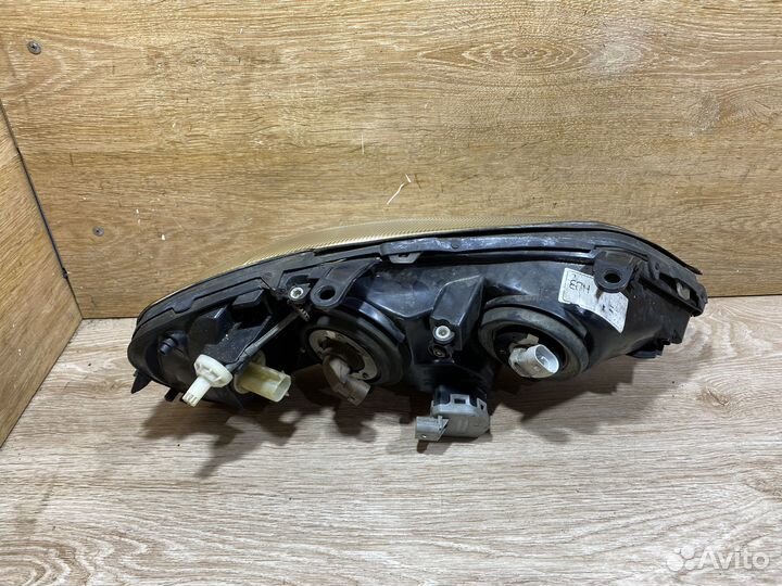 Фара передняя левая Opel Astra G 142299