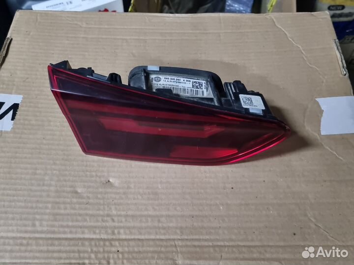 Фонарь левый в крышку багажника Volkswagen Polo