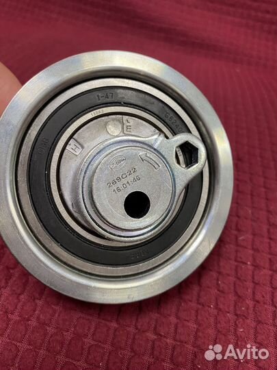 Натяжитель ремня грм skoda Octavia