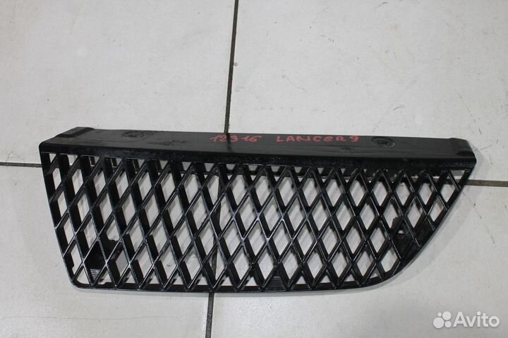 Решетка радиатора левая митсубиси лансер 9 рест