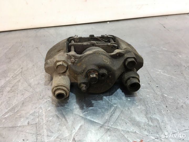 Суппорт тормозной передний левый Kia Rio 1 седан