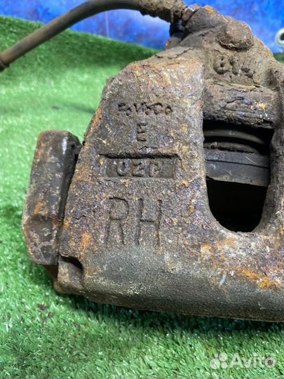 Суппорт тормозной передний правый Mazda 3 BL Z6