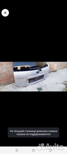 Крышка багажника таета аква