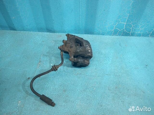 Суппорт передний правый Opel Astra J P10 A14XER