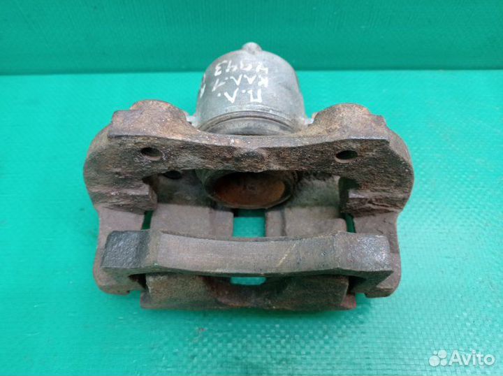 Суппорт тормозной передний левый Лада Калина 1