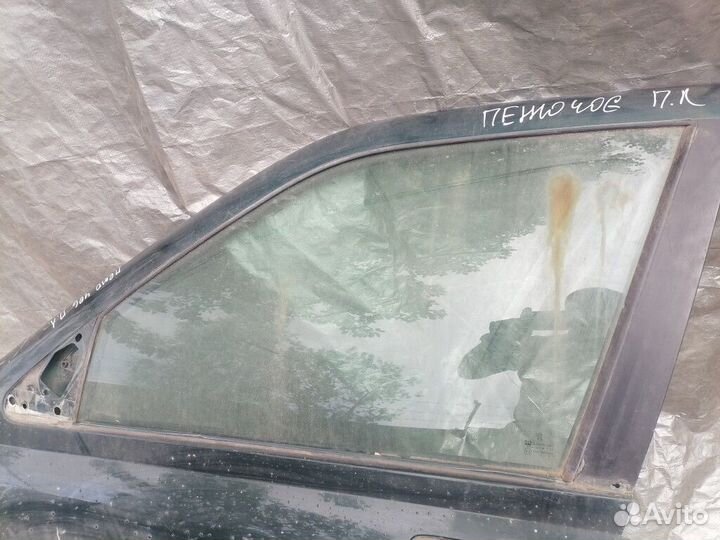 Стекло двери передней левой Peugeot 406