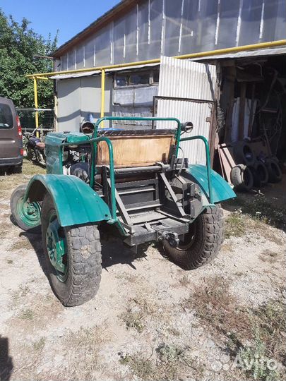 Трактор-самоделка с прицепом и плугом