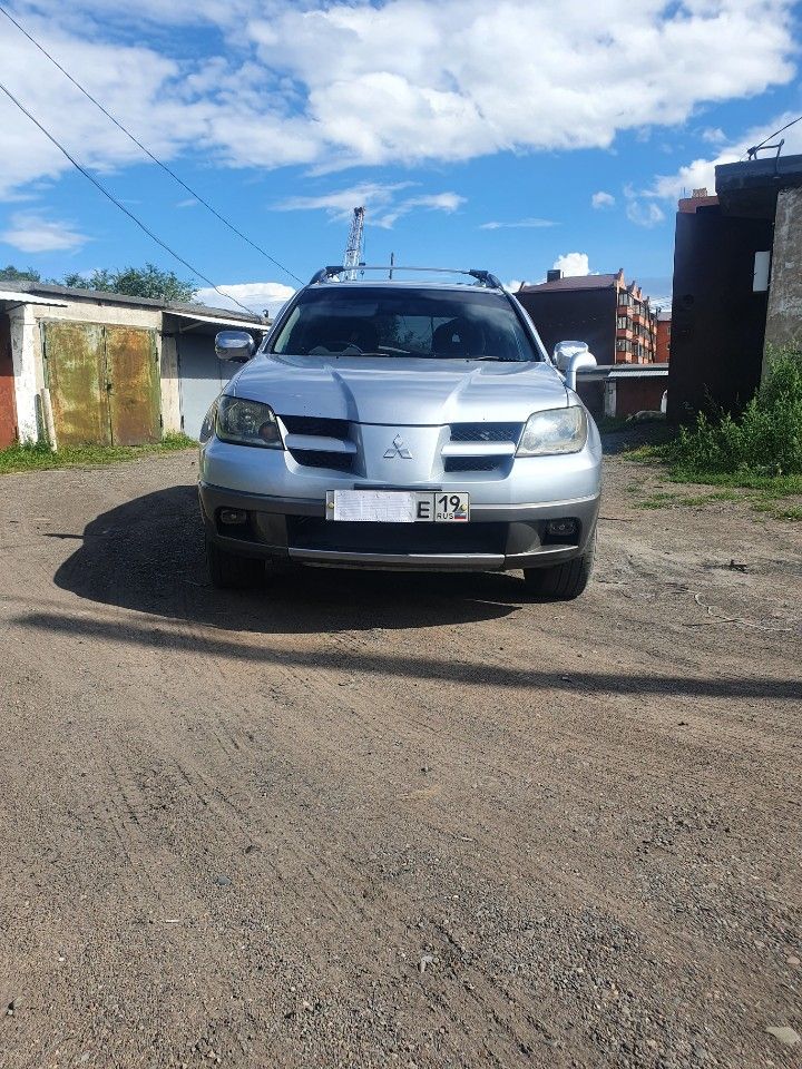 Mitsubishi Airtrek: фото владельца