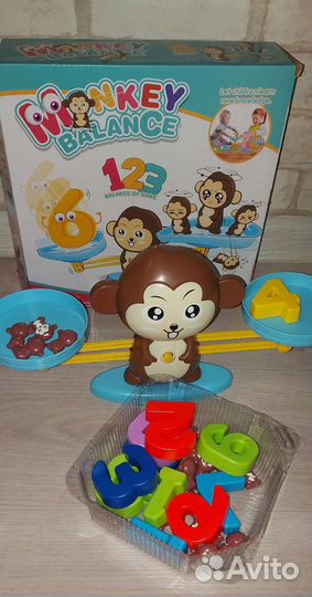 Развивающая игрушка-весы