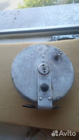 Катушка рыболовная инерционная